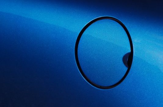 metallic blue vehicle fuel filler cap