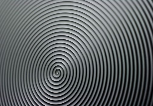 Stainless steel radial texture.
