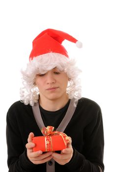 The teenager in a hat santa claus isolated on white background