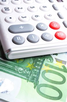 calculator and euro money showing accounting or finance concept