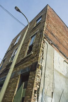 an old abandonned building with broken windows