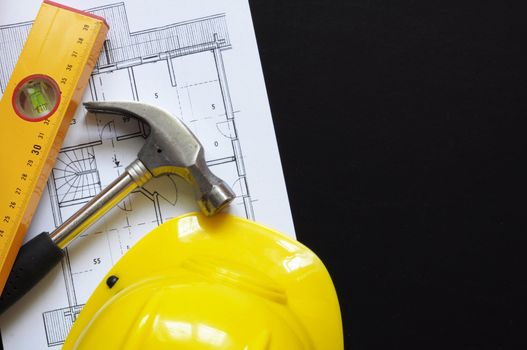construction concept with hard hat working tools and copyspace