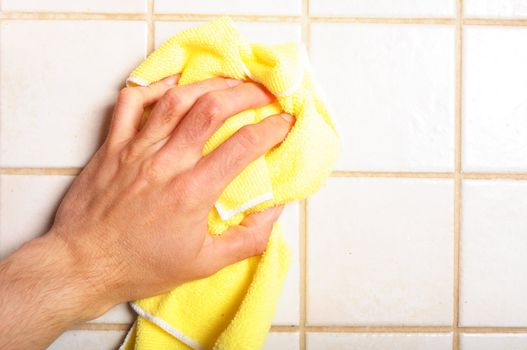 cleaning your home or houshold concept with hand and cloth