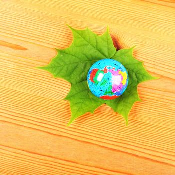 globe and leaf showing nature concept with copyspae