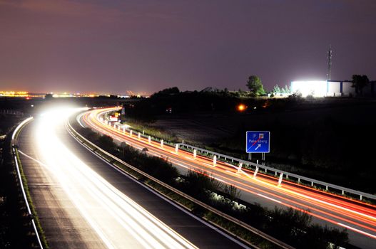 night traffic motion blur on highway showing car or transportation concept