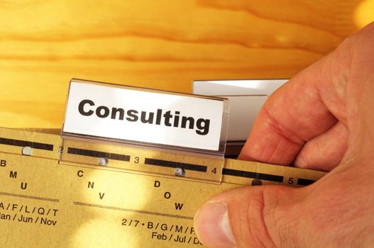 consulting word on business office folder rider showing financial success concept