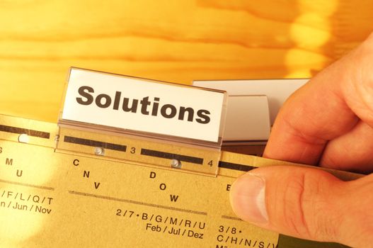 solution word on business folder showing solving a problem concept