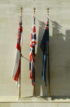 british flags of remembrance on a wartime memorial