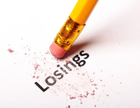 losing lose or luck concept with word and eraser on white background
