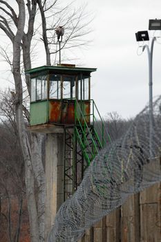 Abandoned guard tower on a prison wall