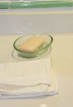 soap in a dish with a folded face close for washing