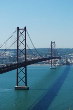 famous bridge Abril 25th and old Salazar Bridge in Lisbon, Portugal