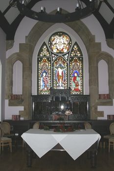 stained glass window in the interior of a church
