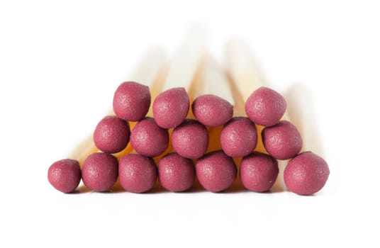 Macro view of stack of matches isolated over white