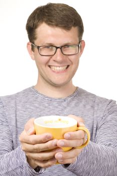 Smiling man with yellow cup(focus on cup)