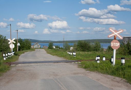 Splitting road, old railway moving, sign STOP