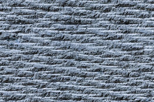 Grooved asphalt or rock surface texture seamlessly tileable with blue tint