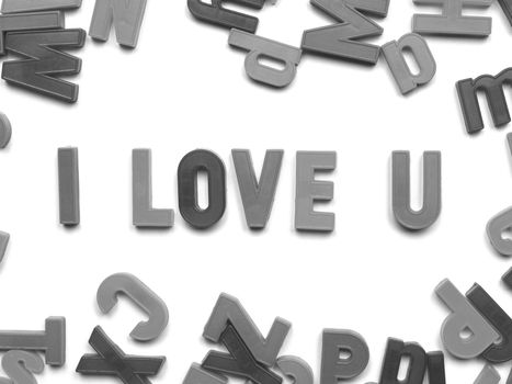 I love you message written with plastic toy characters