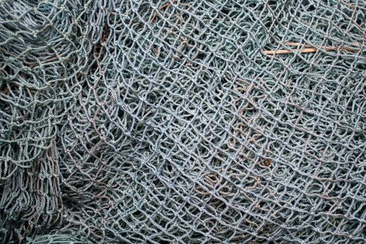 Close up of gray industrial fishing net background