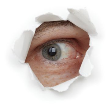 Eye of the person in a hole close up isolated on white background