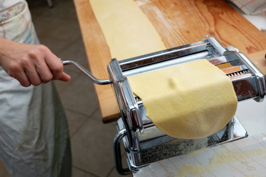 fresh egg pasta rolled in typical italian pasta machine