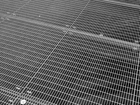 Stainless steel grid mesh useful as a background