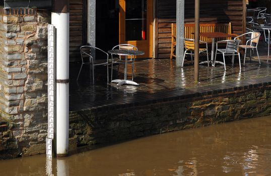 rising levels close to a riverside cafe