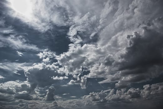clouds in the sky drifting away in a light breeze