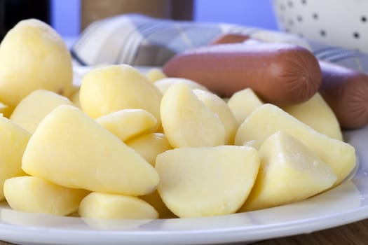 Raw ingredients:  peeled and cut potatoes and vegetarian sausages.