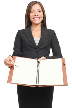 Business woman writing / signing in paper document . Asian professional isolated on white background. 