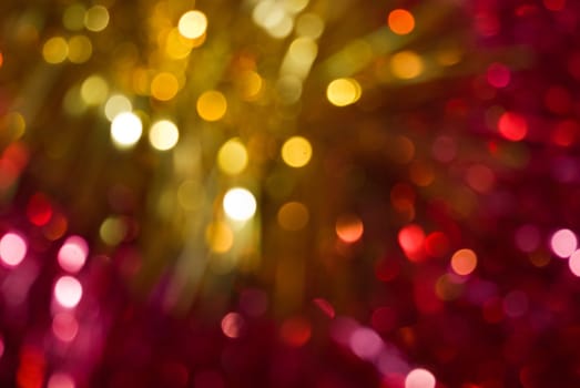 The colored abstract christmas lights as background
