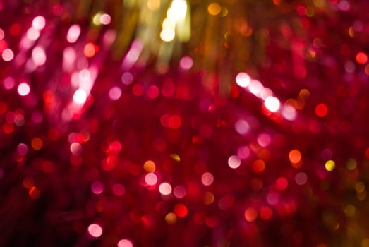 The colored abstract christmas lights as background
