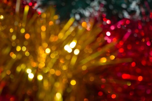 The colored abstract christmas lights as background