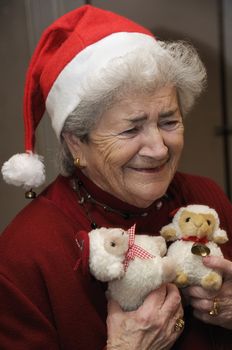 Funny old senior woman at christmas party