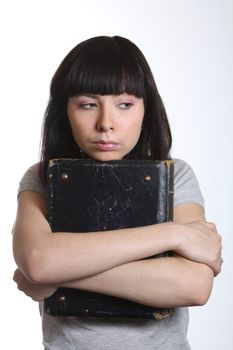 young girl with old book