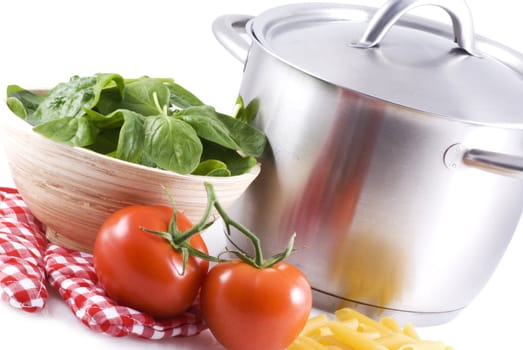 A pan and some ingredients on a white background.