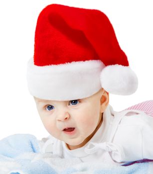 baby in a Christmas hat on a white background
