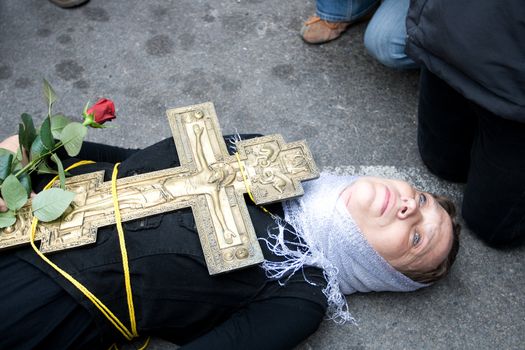 RIGA, LATVIA, MAY 16, 2009: Protesting woman against Gay, lesbian and their supporters at parade in the Latvian capital, accompanied by a strong police presence and loud protest from anti-gay activists.