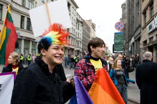 RIGA, LATVIA, MAY 16, 2009: Gay men and women and their supporters at parade in the Latvian capital, accompanied by a strong police presence and loud protest from anti-gay activists.