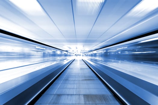 moving escalator in business center