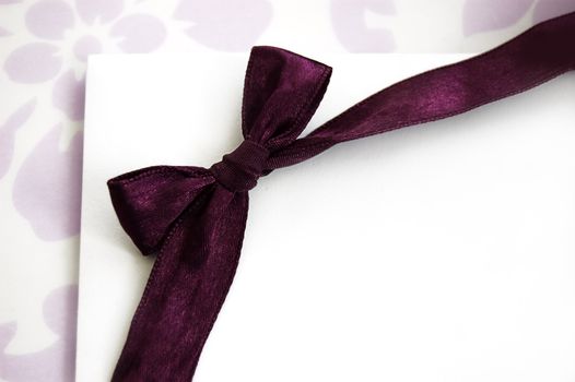 Gift card on holidays with violet bow