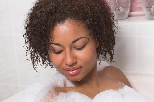 Beautiful woman enjoying her bath