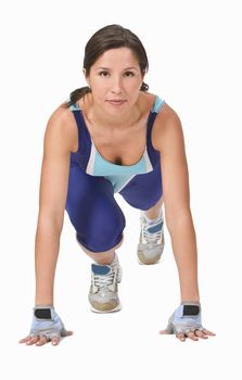 Fitness girl in a stretching position-frontal view.