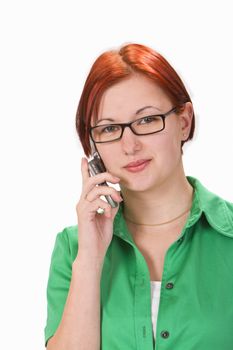 Portrait of a redheaded girl using a mobile phone.Shot with Canon 70-200mm f/2.8L IS USM