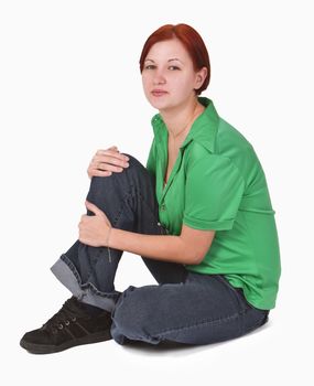 Image of a redheaded teenager girl sitting.Shot with Canon 70-200mm f/2.8L IS USM