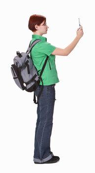 Teenager taking photos using a mobile phone camera-profile.