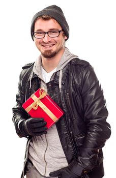 Warmly Dressed Handsome Young Man Holding Wrapped Gift Isolated on a White Background.