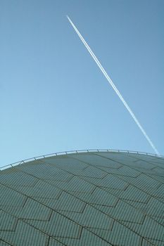 jet flying over opera house in sydney, abstract photo