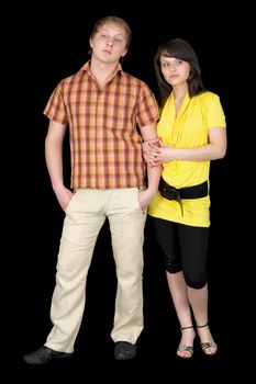 Serious guy and the girl on a black background