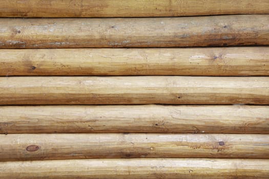 Wall of a building made of wooden logs